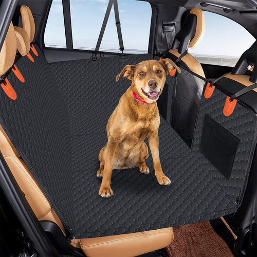 A dog standing on the flat platform of The Whole Back Seat, installed across the rear seat and footwell